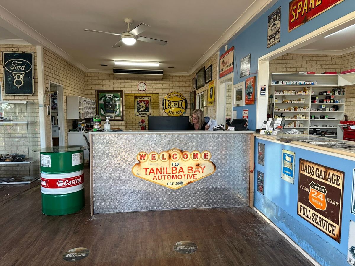 Tanilba Bay Automotive reception counter and spare parts area, welcoming Nelson Bay drivers